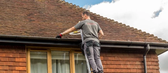 Gutter cleaning a residential property in Essex
